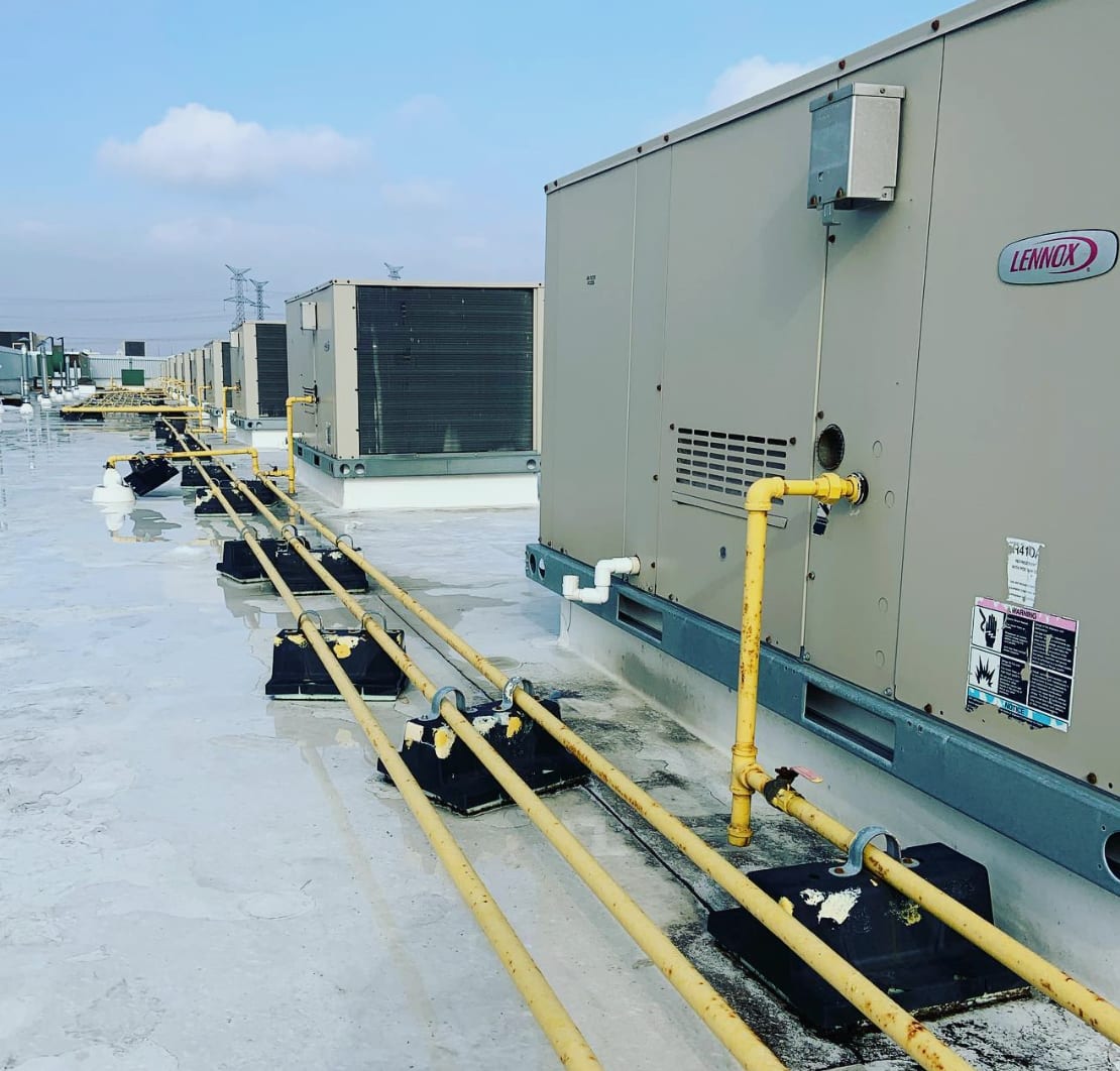 Commercial Lennox rooftop HVAC units serviced by Complete Air Solutions